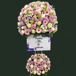 Bunga standing surabaya ucapan Dirgahayu PT Graha Sarana Gresik dari CV Makmur Abadi dengan rangkaian mawar putih, gerbera pink, dan lily